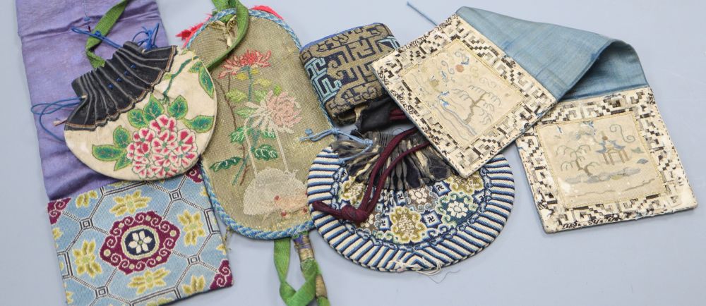 Six 19th century Chinese finely embroidered silk purses, pouches and pockets for carrying seals and coins, mostly embroidered with